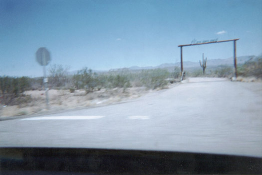 I actually kinda like this one. I waited until just the right moment when we were passing by before I took the picture, so the cactus would be centered under the entrance like that.